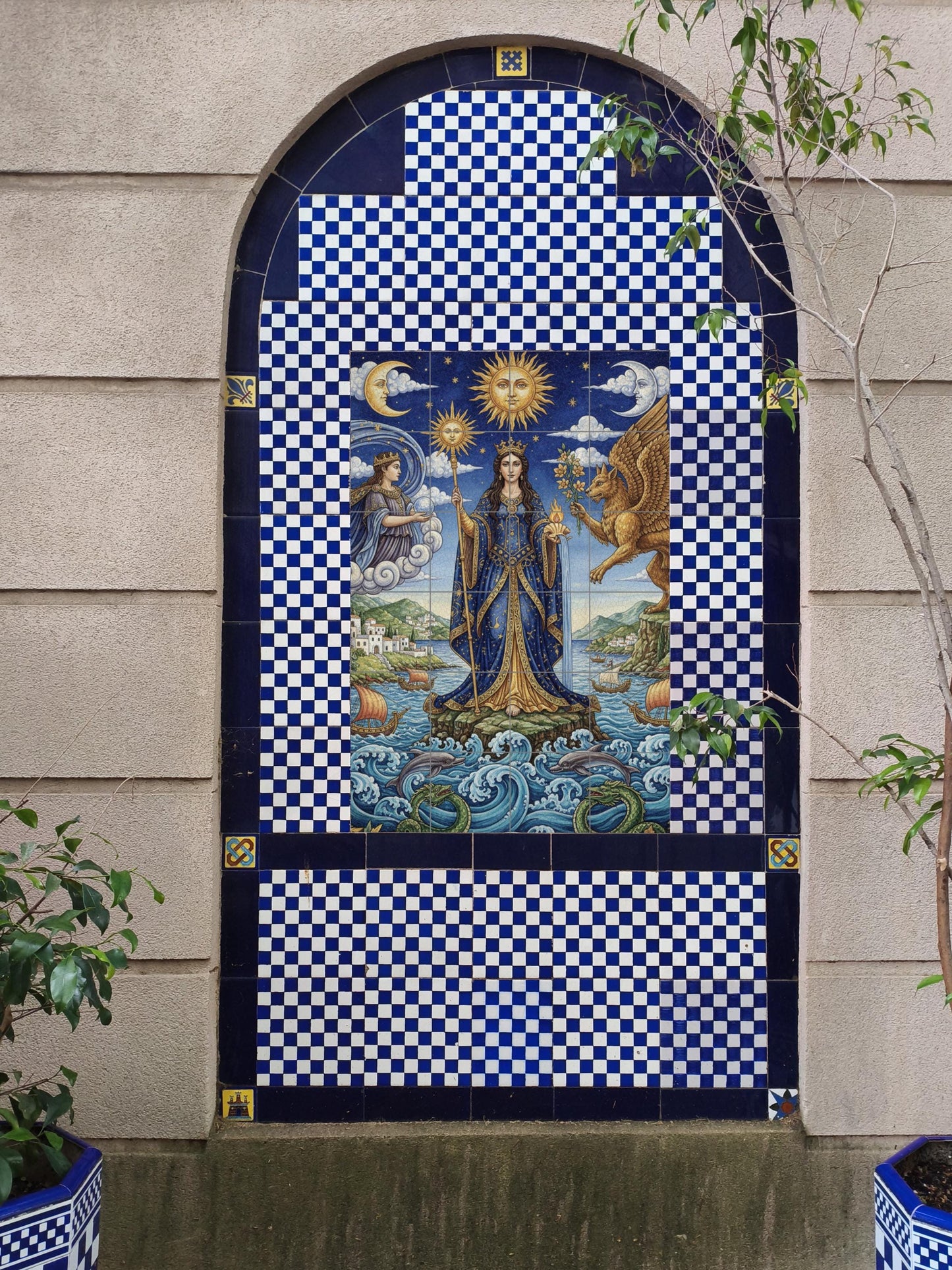 Queen of the Sun and the Sea – Mythological ceramic mural with goddess, griffin and celestial symbols / Mediterranean artistic mural art
